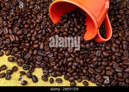Coffee Cup Spilling Beans Still Life Stock Photo