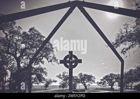 A Hurricane Katrina Memorial stands in front of a Hurricane Camille memorial at the Episcopal Church of the Redeemer in Biloxi, Mississippi. Stock Photo