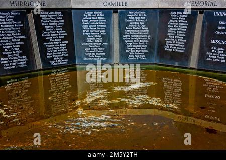 A Hurricane Camille memorial is obscured by mud on the former site of the Episcopal Church of the Redeemer, Dec. 28, 2022, in Biloxi, Mississippi. Stock Photo