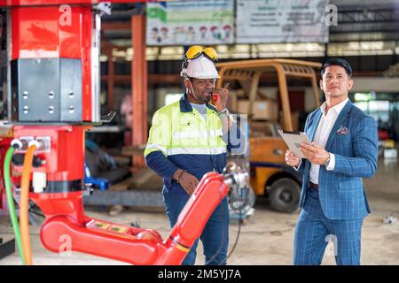 Engineer customer service explain introduction of new design robotic ...