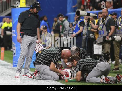 Ohio State head coach Ryan Day, front, reacts to the video replay ...