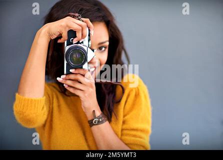A Young Asian Girl Posing And Smiling With A DSLR Camera. Stock Photo,  Picture and Royalty Free Image. Image 9312189.