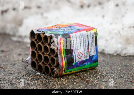 RIGA, LATVIA. 1st January. Selective focus photo. Empty boxes of firework on the street in Riga city. Stock Photo