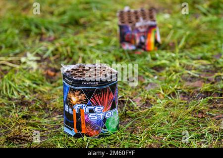 RIGA, LATVIA. 1st January. Selective focus photo. Empty boxes of firework on the street in Riga city. Stock Photo