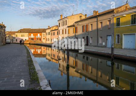 Houses reflected in the canal, Via Agatopisto, Comacchio, Emilia Romagna, Italy Stock Photo