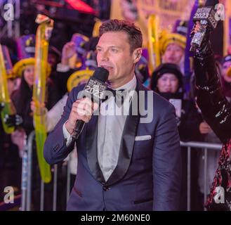 NEW YORK, N.Y. – December 31, 2022: Ryan Seacrest is seen in Times Square during a New Year's Eve broadcast. Stock Photo