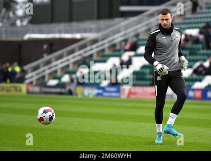 Plymouth Argyle goalkeeper Callum Burton  (25) warming up  during the Sky Bet League 1 match Plymouth Argyle vs MK Dons at Home Park, Plymouth, United Kingdom, 1st January 2023  (Photo by Stanley Kasala/News Images) in Plymouth, United Kingdom on 1/1/2023. (Photo by Stanley Kasala/News Images/Sipa USA) Stock Photo