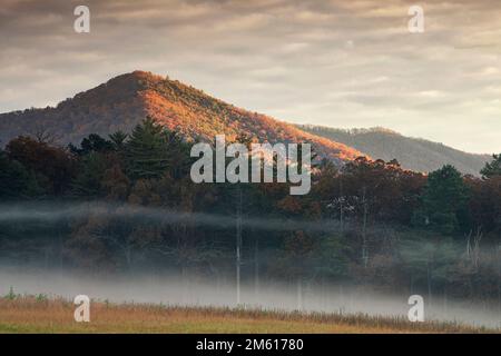 Misty autumn morning in the Cades Cove section of Great Smoky Mountains National Park in Tennessee Stock Photo