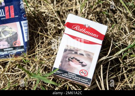 Nakuru, Kenya. 01st Jan, 2023. An empty packet of Rothmans Cigarettes with a health warning written 'Tobacco Use causes mouth cancer' litters the environment near a popular entertainment spot in Nakuru. A study conducted by researchers at California's UC Davis Comprehensive Cancer Center says nearly half of the deaths from 12 cancers are due to tobacco use. (Photo by James Wakibia/SOPA Images/Sipa USA) Credit: Sipa USA/Alamy Live News Stock Photo
