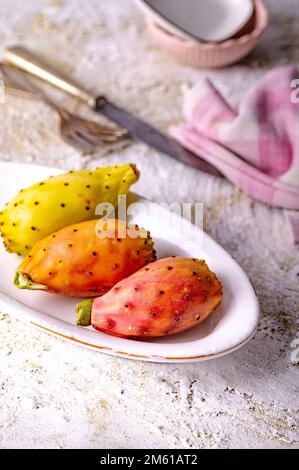 Colorful prickly pears on oval plate Stock Photo