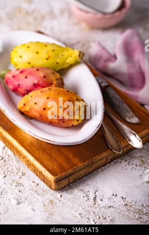 Colorful prickly pears on oval plate Stock Photo