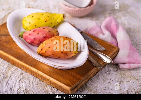 Colorful prickly pears on oval plate Stock Photo