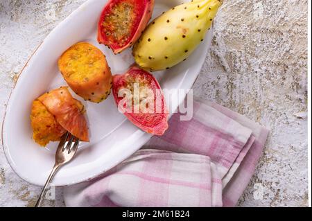 Colorful prickly pears on oval plate Stock Photo