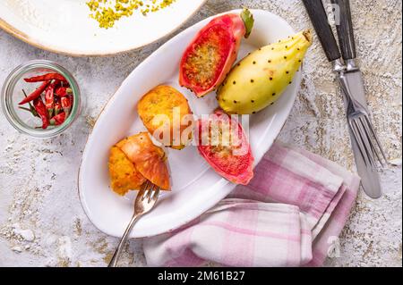 Colorful prickly pears on oval plate Stock Photo