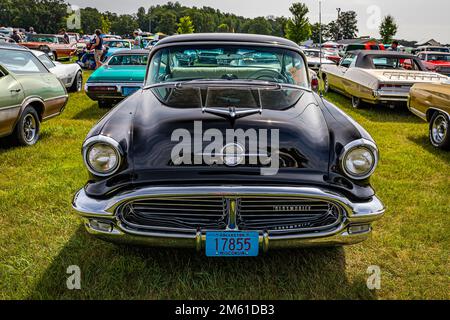 Iola, WI - July 07, 2022: High perspective front view of a 1956 Oldsmobile 88 Holiday Sedan at a local car show. Stock Photo