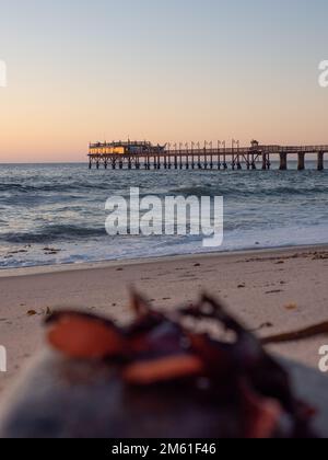 Jetty at the beach in Swakopmund, a coastal town in Namibia Stock Photo