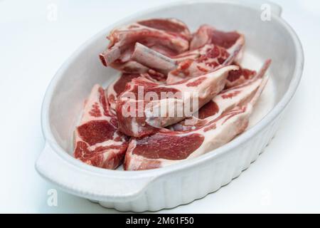 Raw lamb cutlet on white background Stock Photo