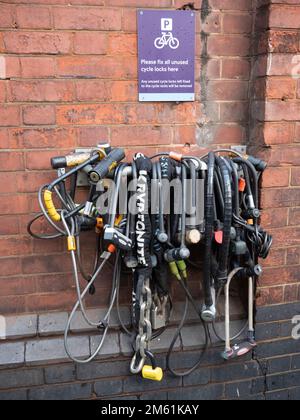 Waterloo London UK, masses of cycle locks stored on hook Stock Photo