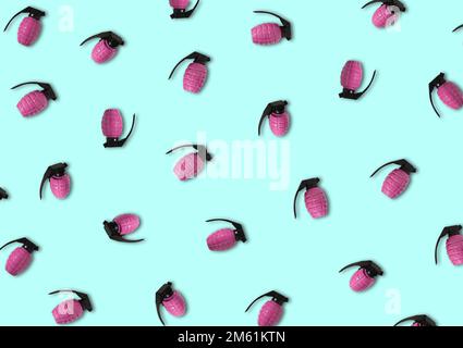 pattern of pink love grenades, creative holiday concept, and blue background Stock Photo