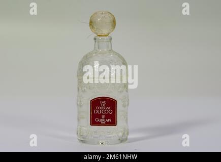 Aachen February 2021: Close-up of a miniature perfume Eau de Cologne du Coq has been available since 1894. The nose behind this perfume is Aime Guerla Stock Photo