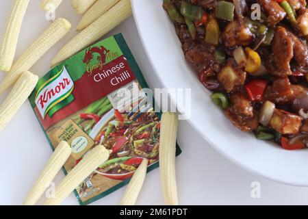 Mumbai, India, January 01 2023: Chilly paneer with baby corn along with Knorr ready to cook Chinese chilly gravy mix. An Indo Chinese dish made with p Stock Photo