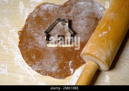 gingerbread dough roll on the table rolled out dough for making cookies. Stock Photo