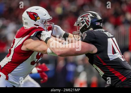 Atlanta, Georgia, USA. 1st Jan, 2023. Arizona Cardinals defensive end J.J. Watt (99) goes up against Atlanta Falcons tight end Parker Hesse (46) on a play during the game between the Arizona Cardinals and the Atlanta Falcons at Mercedes Benz Stadium, Atlanta, Georgia. (Credit Image: © Scott Stuart/ZUMA Press Wire) Credit: ZUMA Press, Inc./Alamy Live News Stock Photo