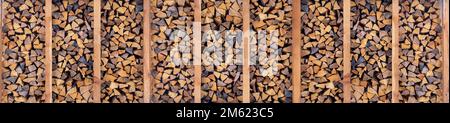 Horizontal banner or pile of cut wood for fireplace Stock Photo