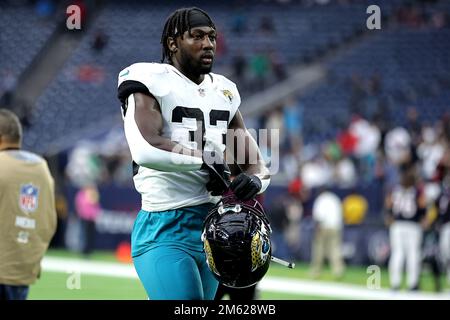 Jacksonville Jaguars linebacker Devin Lloyd (33) defends against the Dallas  Cowboys during an NFL Football game in Arlington, Texas, Saturday, August  12, 2023. (AP Photo/Michael Ainsworth Stock Photo - Alamy