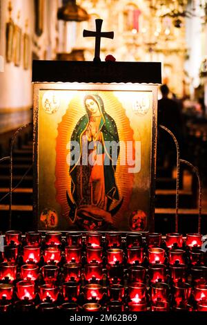 St. Mary Portrait and Candles at Mission San Juan Capistrano, Southern Calilfornia Stock Photo