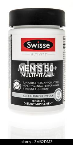 Winneconne, WI - 28 November 2022: A package of Swisse ultivite mens multivitamin supplement on an isolated background. Stock Photo