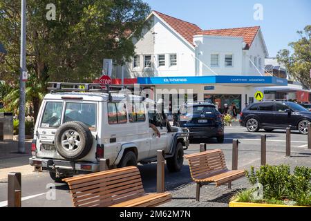 Avalon Beach village centre now amended to become partly one way , toyota troopy landcruiser on the one way route,Sydney,NSW,Australia Stock Photo