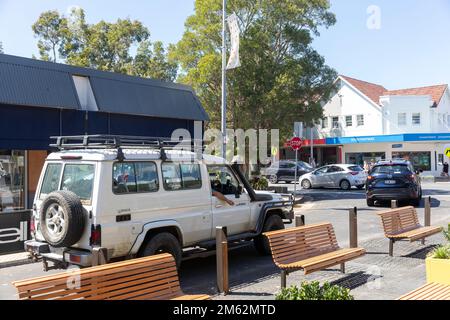 Avalon Beach village centre now amended to become partly one way , toyota troopy landcruiser on the one way route,Sydney,NSW,Australia Stock Photo