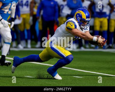 Inglewood, California, USA. 01st Jan, 2023. Los Angeles Rams quarterback Baker Mayfield scrambles with the ball during the NFL football game between the Los Angeles Rams and the Los Angeles Chargers in Inglewood, California. Mandatory Photo Credit : Charles Baus/CSM/Alamy Live News Stock Photo