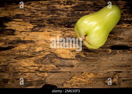 green rose apple on wooden. dark. Stock Photo