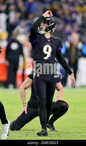 Baltimore Ravens kicker Justin Tucker (9), with Jordan Stout