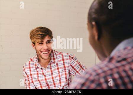 Two architects and engineers working at the Office Stock Photo