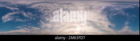 Dark blue sunset sky panorama with golden Cumulus clouds. Seamless hdr 360 panorama in spherical equirectangular format. Full zenith for 3D Stock Photo