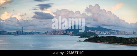 Hi-resolution panorama of the city skyline of Hong Kong Island and Kowloon at sunset, viewed from Lantau Island, 2012 (79Mpx) Stock Photo