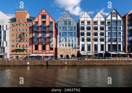 Gdansk, Poland - October 4, 2022 - Buildings on the Granary Island with Radisson Hotel and Suites in the middle at Motlawa River. Stock Photo