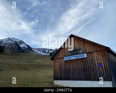 Schetteregg, Austria. 02nd Jan, 2023. Completely green and without snow is a slope at a lift in the ski resort Schetteregg. It is currently much too warm here for the time of year. Credit: Benedikt von Imhoff/dpa/Alamy Live News Stock Photo
