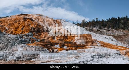 Colorful mineral deposit at Mammoth Hot Springs in Yellowstone National Park, Wyoming, United States. Mammoth Hot Springs is a large complex of hot sp Stock Photo