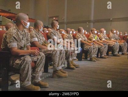 U.S. Marine Corps recruits with Fox Company, 2nd Recruit Training Battalion, attend a class on customs and courtesies at Marine Corps Recruit Depot San Diego, March 30, 2022. The intent of military courtesies is to reinforce discipline and the chain of command. Stock Photo