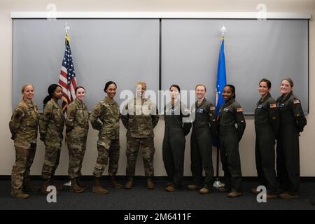 Airmen assigned to the 305th Air Mobility Wing and 514th Air Mobility Wing pose for a photo as part of the Women’s History Month heritage flight at Joint Base McGuire-Dix-Lakehurst, N.J., Mar. 30, 2022. In honor of Women’s History Month, an all-female KC-10 flight crew from the 305th AMW and 514th AMW flew an aerial refueling training mission over Maine and the Atlantic Ocean. Stock Photo