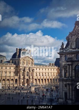 Louvre Museum territory, Paris, France. The famous palace site view vertical background Stock Photo