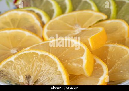 Freshly Cut Natural Healthy Juicy Organic Orange Slices Or Segments On A Plate Stock Photo