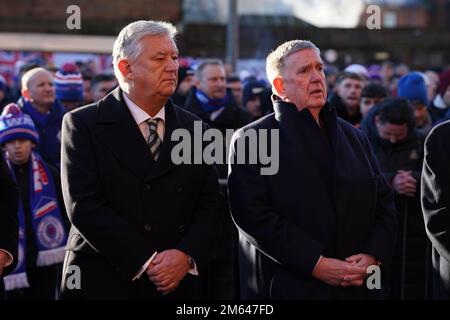 Celtic chief executive Peter Lawell (left) and Rangers Chairman Douglas Park (right) observe a moments silence in memory of those that died in the Ibrox disaster, ahead of the cinch Premiership match at Ibrox Stadium, Glasgow. Picture date: Monday January 2, 2023. Stock Photo