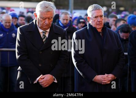 Celtic chief executive Peter Lawell (left) and Rangers Chairman Douglas Park (right) observe a moments silence in memory of those that died in the Ibrox disaster, ahead of the cinch Premiership match at Ibrox Stadium, Glasgow. Picture date: Monday January 2, 2023. Stock Photo