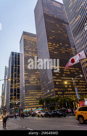 Skyscrapers on 6th avenue with West 50th Street, New York City, USA