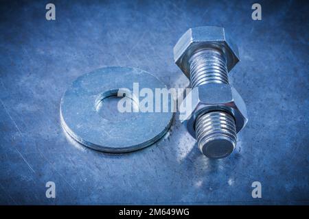 Steel screwbolt bolt washer and screw-nut construction concept. Stock Photo